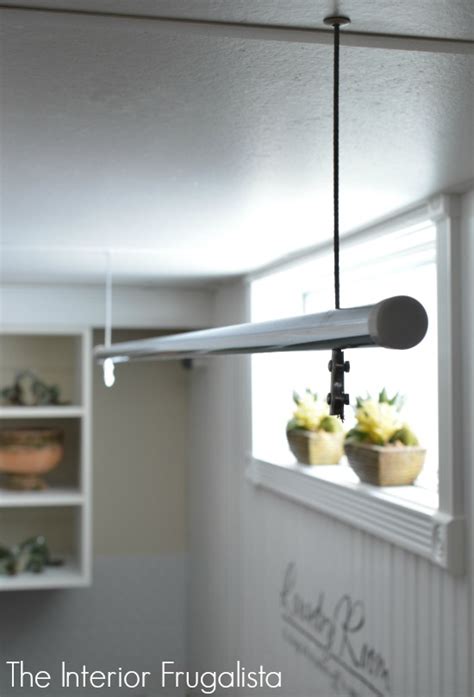 The stain i used is varathane dark walnut. DIY Suspended Clothes Drying Rod - Interior Frugalista