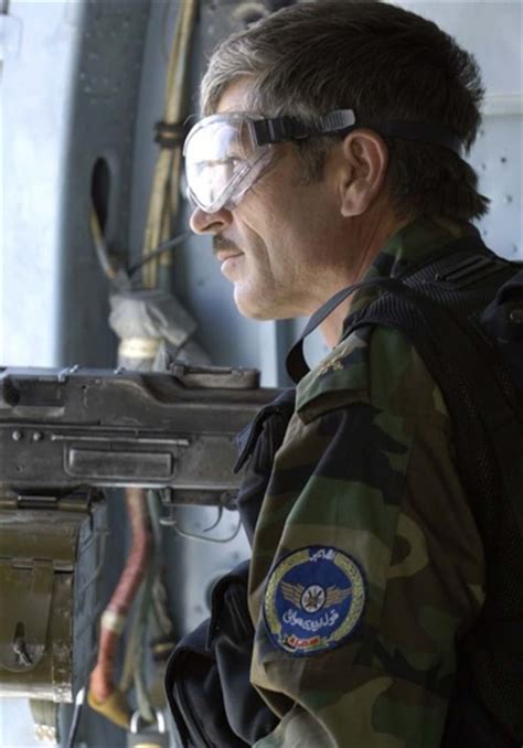 An Mi 17 Helicopter Door Gunner From The Afghan National Army Air Corps