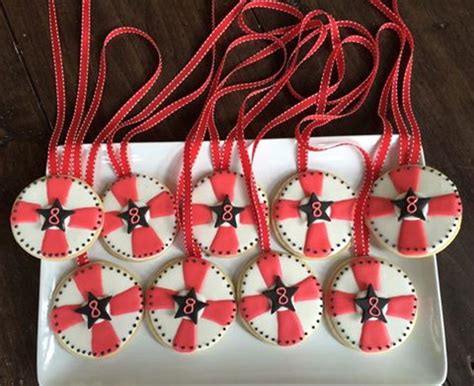 Ninja warrior party at the bravos. American Ninja Warrior Medal Cookies - CakeCentral.com