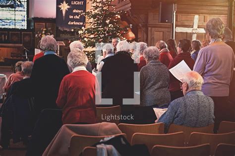 Congregation Singing Hymns At A Christmas — Photo — Lightstock