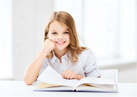 Little Student Girl Studying At School Royalty Free Stock Images