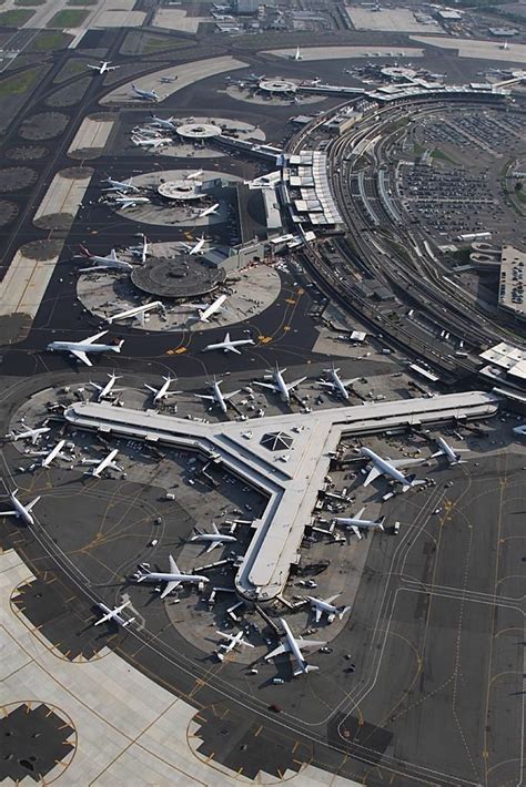 An Aerial View Of Several Planes Parked At The Airport