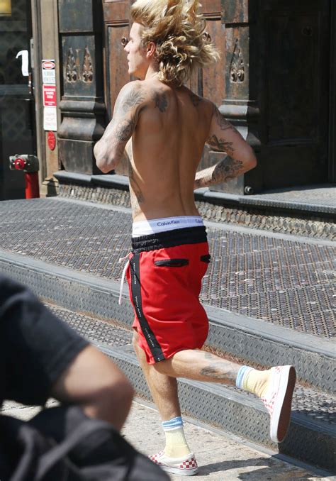 Justin Bieber Out Shirtless In New York City Celeb Donut