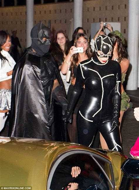 Kim Kardashian Dresses As A Very Seductive Catwoman As She Arrives At Halloween Party With A