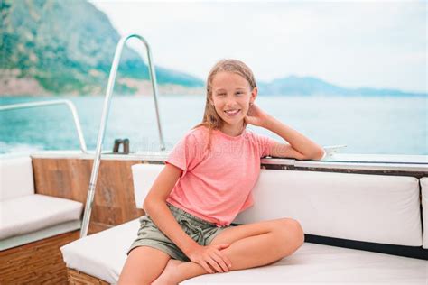 Little Girl Sailing On Boat In Clear Open Sea Stock Image Image Of