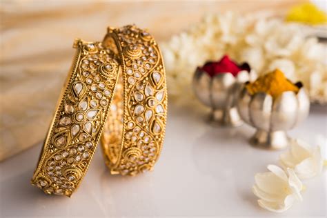 Kalyan Jewellers 24 Carat Gold Gold Jhumka Designs From Tanishq