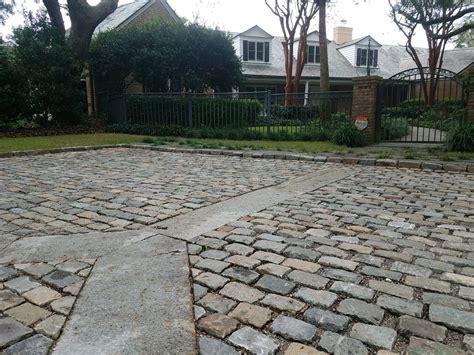 Reclaimed Cobblestones Are A Highlight In This Driveway Driveway