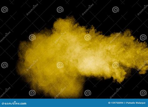Yellow Dust Particles Explosion On Black Backgroundyellow Powder