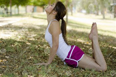 Cute Girl Doing Yoga At A Park Stock Image Image Of Outdoors Peace