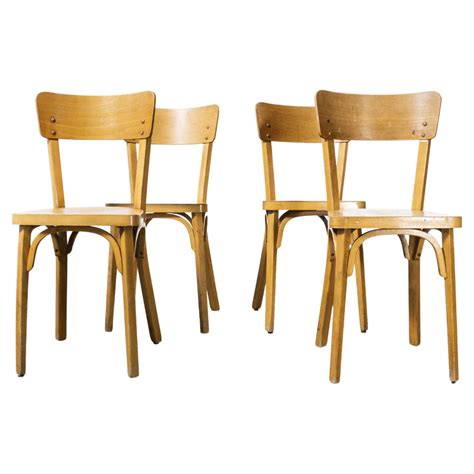 1950s French Baumann Blonde Beech Bentwood Dining Chairs Set Of Four For Sale At 1stdibs