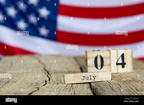 Wooden Calendar With Date On The Background Of The Usa Flag Template