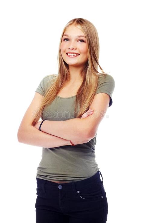 Sweet And Approachable A Gorgeous Teenage Girl Standing With Her Arms