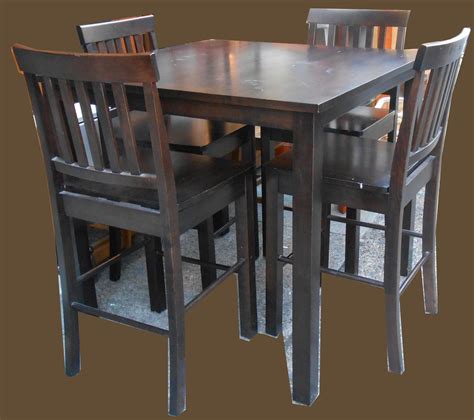 We have counter height chairs and stools at the right height for a tall table and lower ones to use at kitchen worktops and islands. Uhuru Furniture & Collectibles: Pub Table and 4 Chairs- SOLD