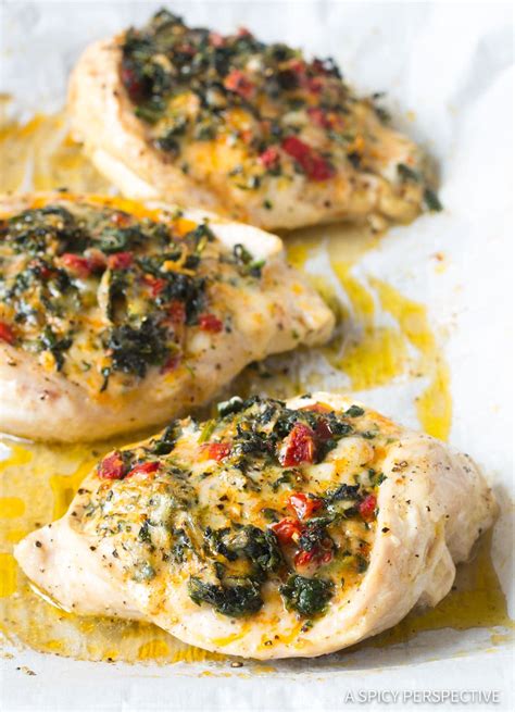 Stir in sour cream, pepperjack cheese, and garlic. Cheesy Spinach Stuffed Chicken Breasts (Video) - A Spicy ...
