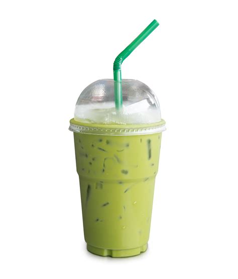 Iced Matcha Green Tea With Condensed Milk In Transparent Plastic Glass