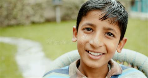Portrait Of A Handsome Young Boy From India Outdoors Stock Image