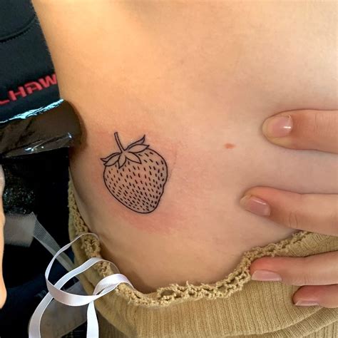 Minimalist Strawberry Tattoo