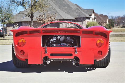 It immediately draws attention with curvaceously low lines and a sleek, yet aggressive demeanor. Ferrari P4 Replica With 575 V12 Has One Too Many Zeros In Its Price | Carscoops