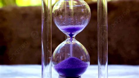 Close Up Shot Of Time Purple Hourglass Background Hd Time Hourglass