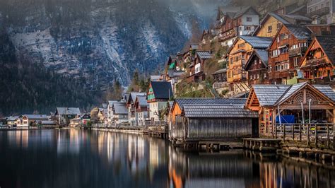 Wood Houses Near Water Reflection On River Mountains Background Hd Lock