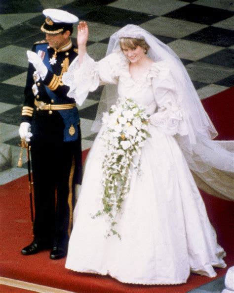 Shortly before the wedding party posed for pictures on the palace's balcony, police allowed the crowd to spill out onto the mall—many raced up to the gates of the palace and some even climbed into the fountain to get a better view. Comparing Meghan Markle & Princess Diana's Wedding Dresses ...