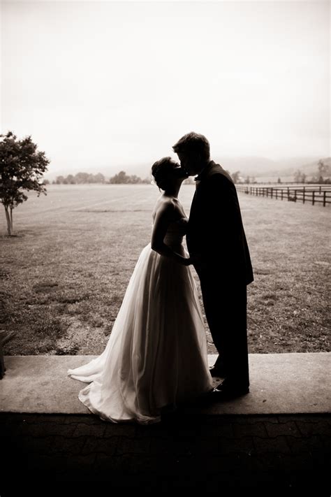 Romantic Wedding Photo Of Bride And Groom Kissing