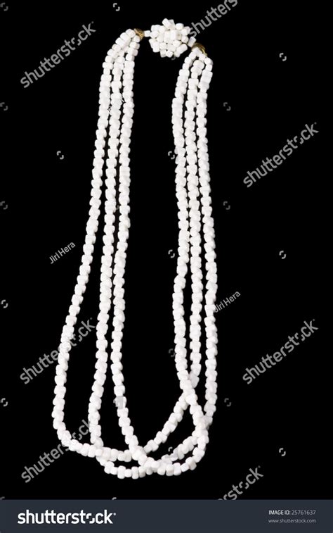 Detail Of White Necklace On Dark Background Stock Photo
