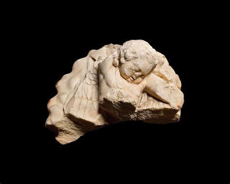 A Fragmentary Roman Marble Figure Of Sleeping Eros Circa St Nd