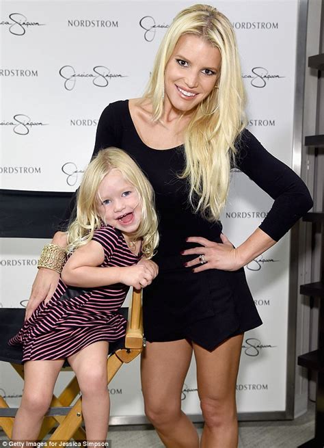 jessica simpson is stunning in floppy black hat and playsuit as she brings daughter maxwell to
