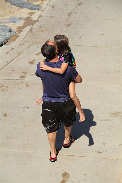 3029 Father Carrying Daughter Outside Imagery Llc