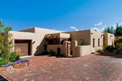 Roots Style Pueblo Revival Architecture Welcomes Home Building Plans
