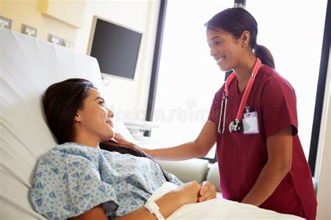 Nurse Talking To Female Patient On Ward Stock Photo Image Of Staff