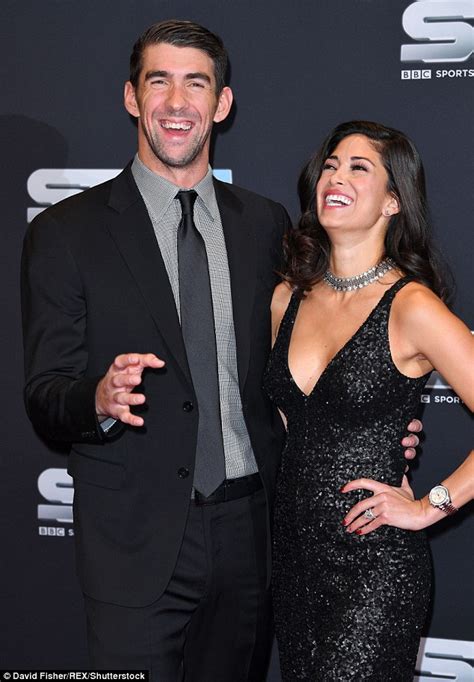 michael phelps wife nicole johnson flaunts her ample cleavage in gown at spoty 2016 daily