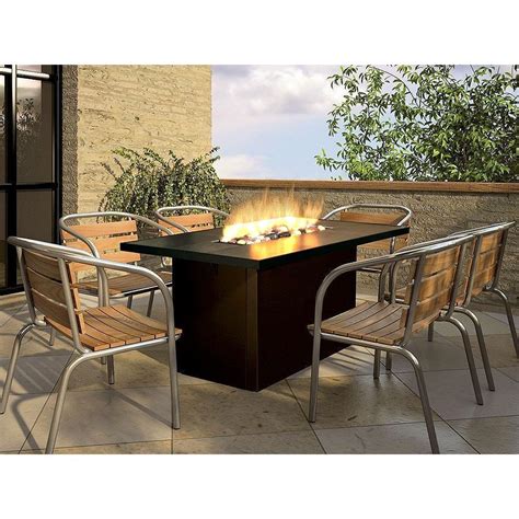 Instantly add a warm, yet modern touch to your outdoor living space with this beautifully handcrafted fire find outdoor fire pits and fire pit tables at costco.com. Outdoor dining tables with gas fire pit | Hawk Haven