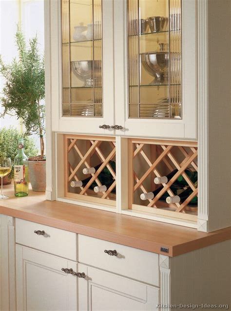 Designed to fit on a counter top, can(old approximately64o 97ine glasses and comes complete with 4 pegs that can be used to stack additional racks. #Kitchen Idea of the Day: Beautiful glass display cabinet ...