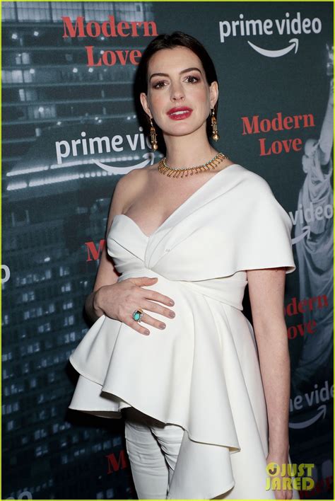 Pregnant Anne Hathaway Cradles Her Baby Bump At Modern Love Event