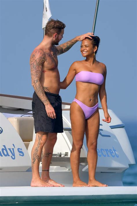 Christina Milian Wears A Purple Bikini On A Yacht While On Vacation With Matt Pokora In Saint