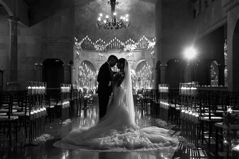 Couple Embracing In Candlelit Church Morgan Lynn Photography