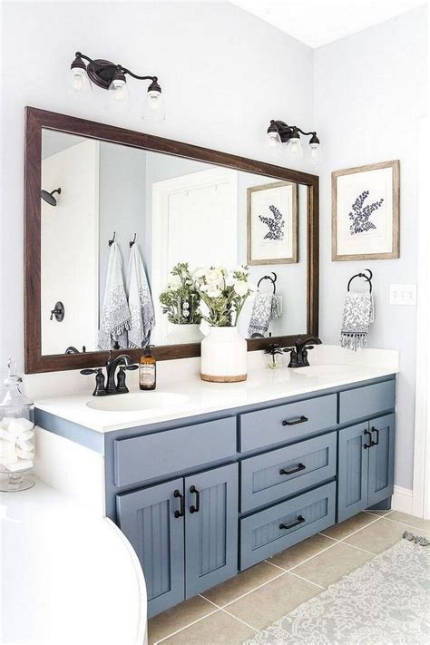 To picture a modern farmhouse bathroom, imagine a simple layout with straightforward shapes, calming color palettes, and fixtures/accessories that nod to rural and agricultural design traditions. Pin on bathroom