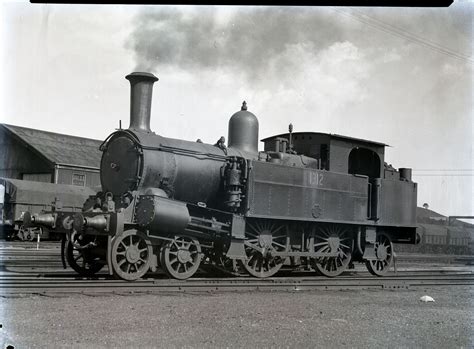 An Old Black And White Photo Of A Steam Engine