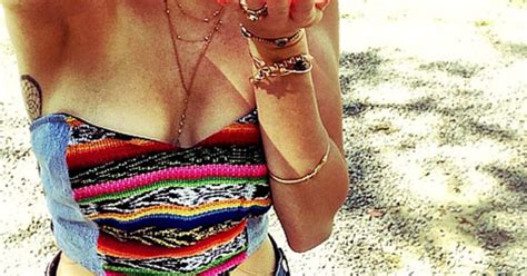 Miley Cyrus Shows Off Flat Stomach During Costa Rica