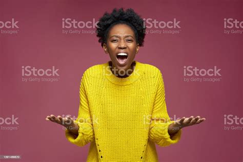 Excited Irritated Expressive African American Young Woman Spreading Hands Scream In Furious