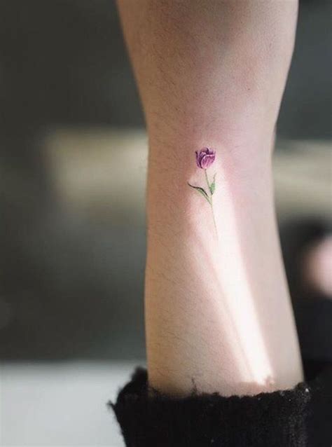 Even though it is small, this tattoo does make a statement. 26 Tiny Floral Tattoos That Are Too Pretty For Words - SHE ...