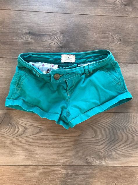 this is a pair of gently worn low rise short shorts in a womens size 4 from american eagle