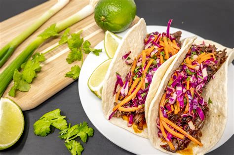 Slow Cooker Korean Beef Tacos With Gochujang Bbq Sauce And Slaw