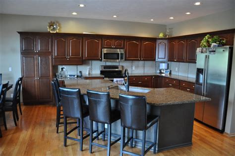 Having them go to the ceiling was just an added bonus! Golden Oak Transformation - Traditional - Kitchen - omaha - by Innovation In Design