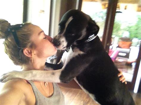 Miley Cyrus Likes To Kiss Her Dogs A Lot She Dog Dog Kisses