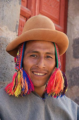 An Amerindian Man With Traditional Hats In The Street Cusco Peru 2008