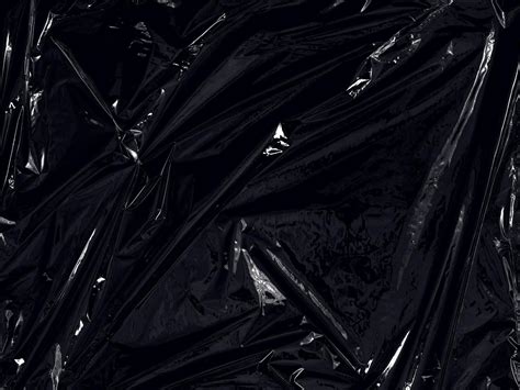 A Transparent Plastic Wrap On Black Background Realistic Plastic Wrap