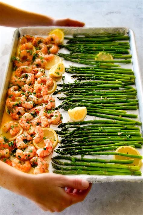 Put the sheet pan into the oven, and bake for another 8 minutes, or until shrimp is pink and cooked through, and mushrooms and asparagus is tender. ONE PAN Roasted Lemon Garlic Butter Shrimp and Asparagus ...